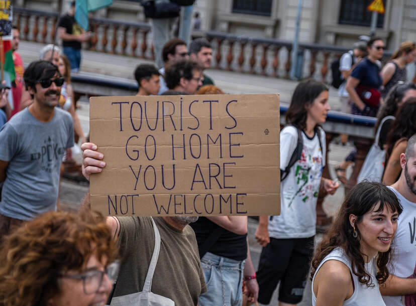 An anti-tourism placard is seen during the demonstration. More than 3,000 people demonstrated against the tourist overcrowding suffered by the city of Barcelona and in favor of tourism reduction policies. 