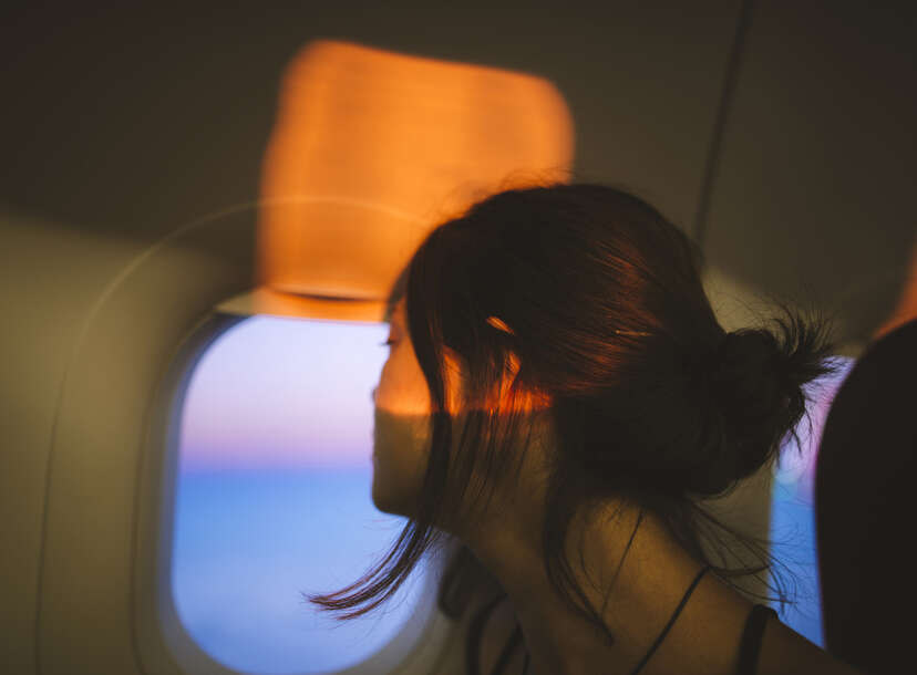 staring out the window on a plane 