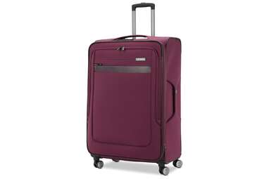 A plum colored Samsonite soft-sided checked bag. 