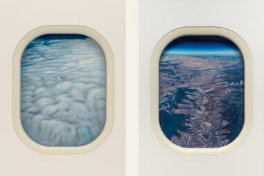 landscape painting through boeing 737 window