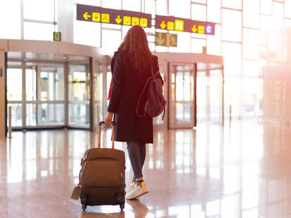woman exiting the airport