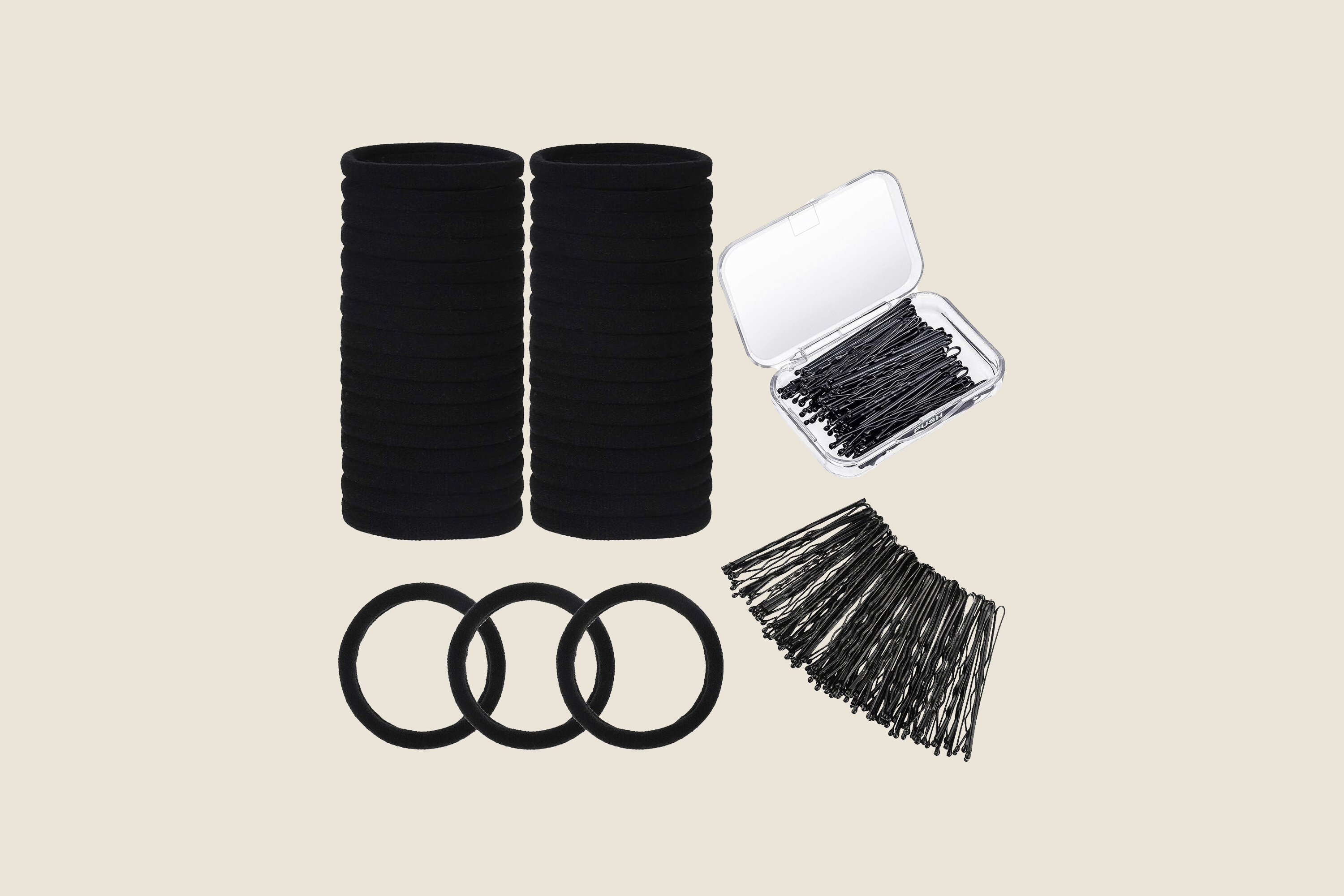 A photo of black hair ties and bobby pins.
