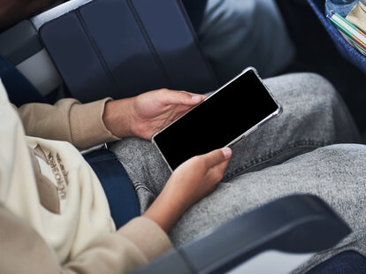 blank phone screen on plane