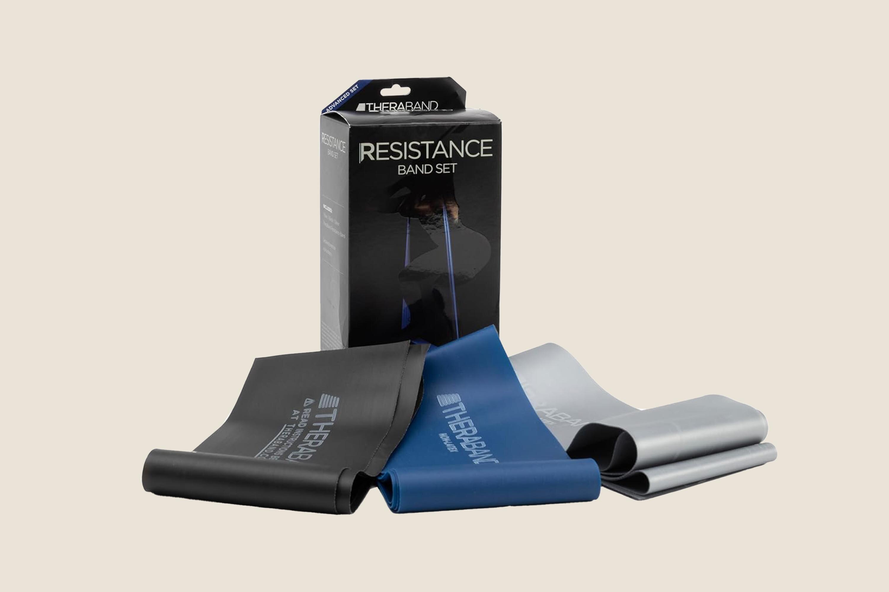 An image of black, blue, and gray therabands with their packaging.