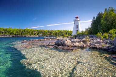 Big tub lighthouse at Tobermory during the day of the Summer.