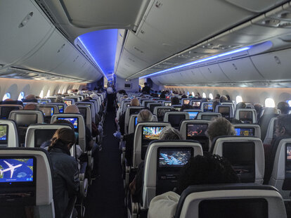 plane seats with passengers