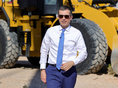 Secretary of Transportation Pete Buttigieg is interviewed before a groundbreaking ceremony at the Brightline West Las Vegas station on April 22, 2024 in Las Vegas, Nevada.