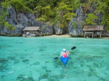 woman kayaking in the philippines
