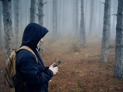 teenager in the woods randonautica app