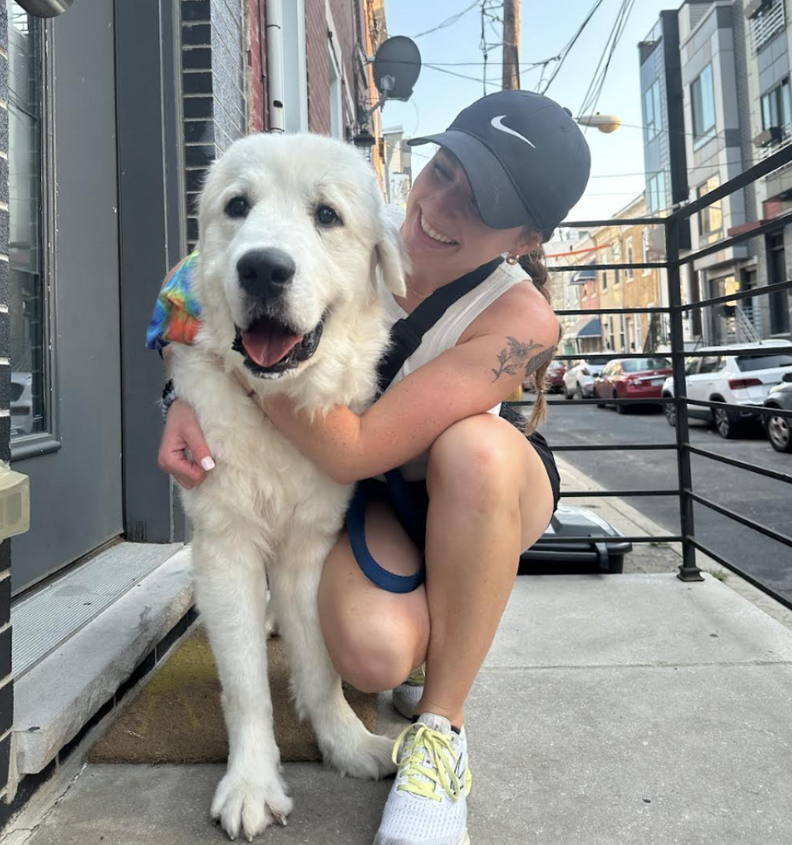 dog and woman hugging