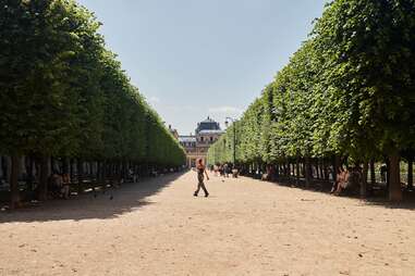 person in garden in paris, france
