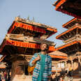 Man with backpack exploring Kathmandu old town