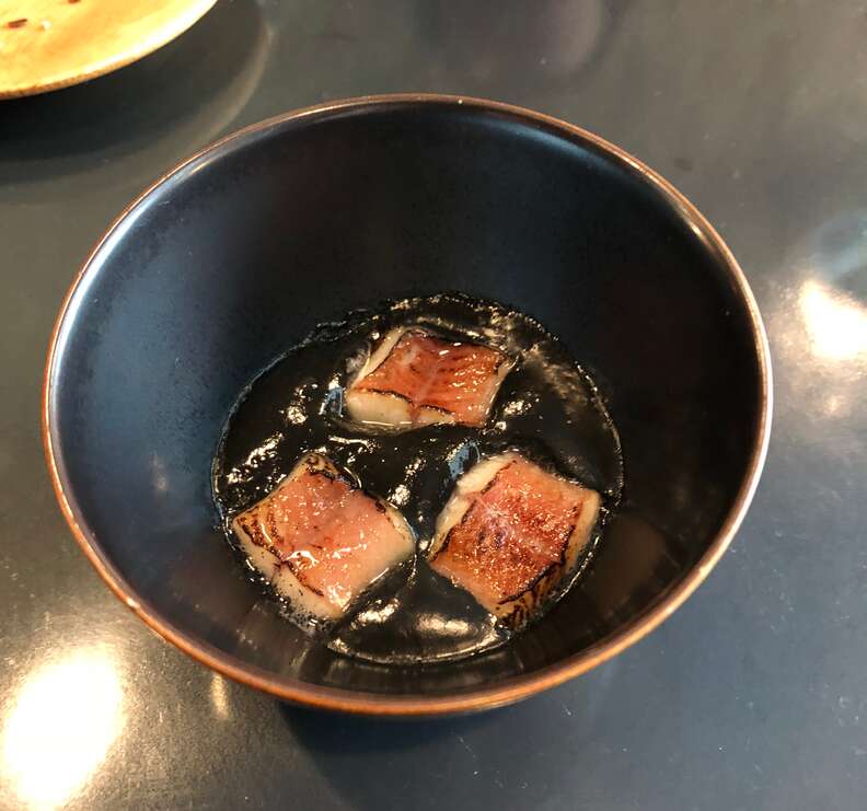 european eel on a plate in a fancy restaurant