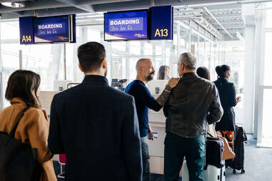 passengers at boarding gate