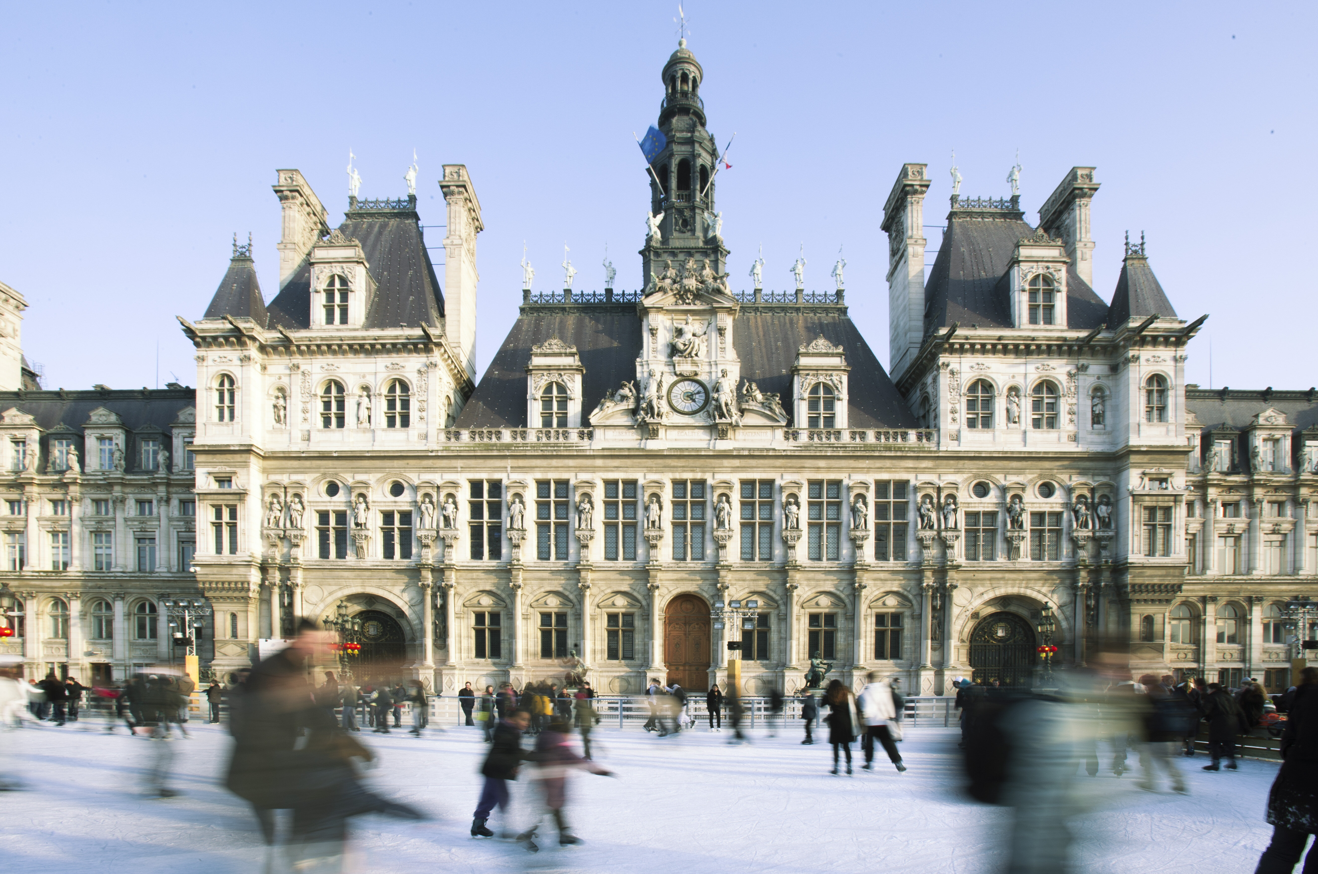 Ice skating at Hotel de Ville ice rink, Paris, France. 