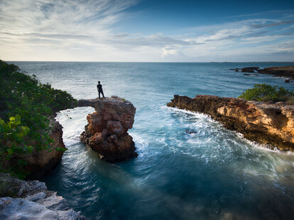 The Cabo Rojo Arch in Puerto Rico, overlooking the ocean in late afternoon.