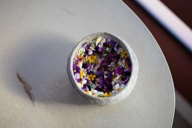 spring flowers in a bowl at vespertine in culver city