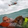 Coast Guard Rushes To Save Man And His Dog From Sailboat During Hurricane Helene