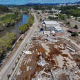 An aerial view of flood damage along the French Broad River in the aftermath of Hurricane Helene on October 2, 2024 in Asheville, North Carolina.