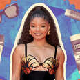 singer Halle Bailey surrounded by her favorite travel items: a water bottle, sunglasses, lip balm and Clorox cleaning wipes