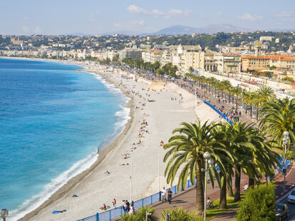 A celebrated promenade along the Mediterranean beach at Nice, France.