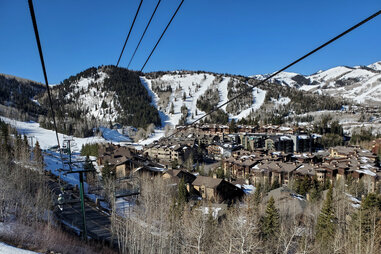 Deer Valley ski resort and lodging seen from above on a ski lift.