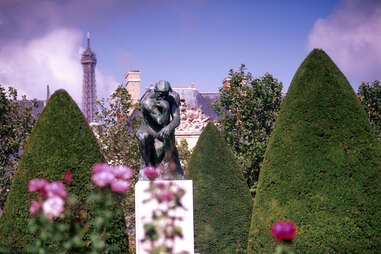 rodin thinker with eiffel tower in background