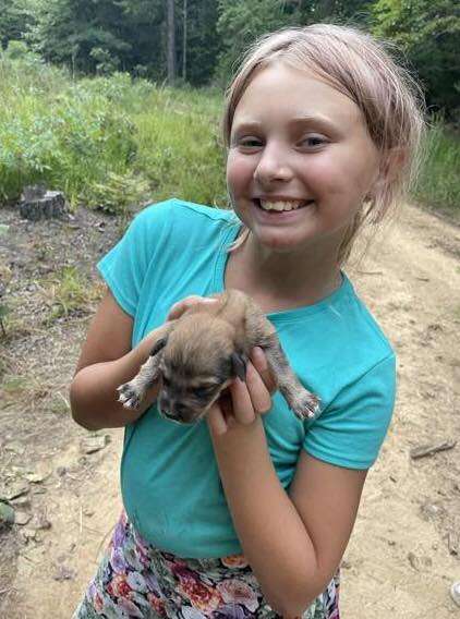 girl with puppy