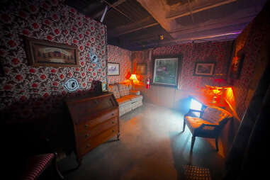 a living room setting in a haunted house
