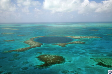 blue hole in belize aerial