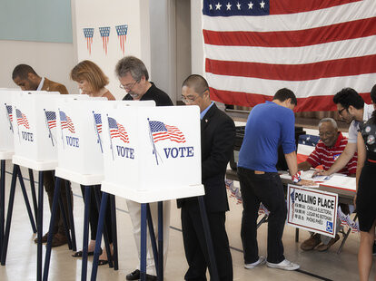 People voting in United States polling place.