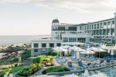 pool deck and hotel by the rock coast at cliff house in Maine