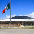 A front view during the inauguration of the Tulum International Airport in Tulum, Mexico with Mexican Flag out front