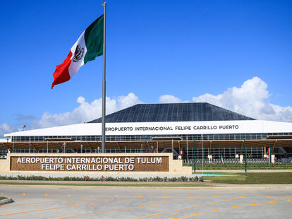 A front view during the inauguration of the Tulum International Airport in Tulum, Mexico with Mexican Flag out front