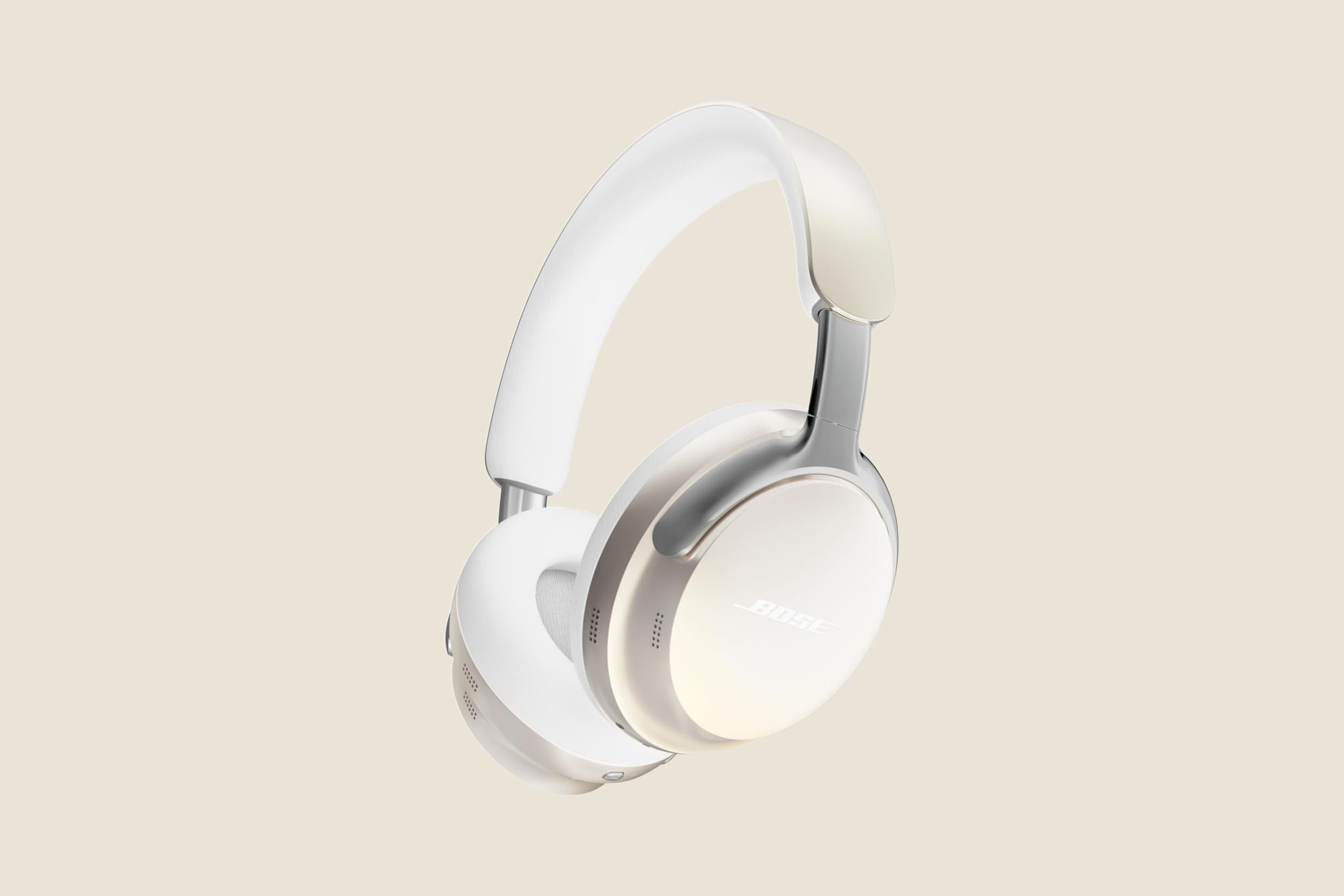 Shiny silver over-ear bluetooth headphones.
