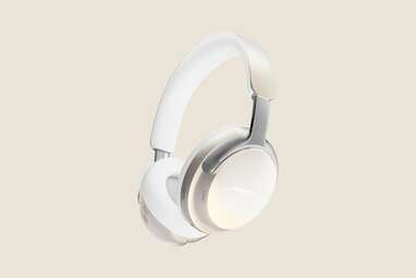 Shiny silver over-ear bluetooth headphones. 