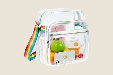 A clear plastic bag with a rainbow colored strap.