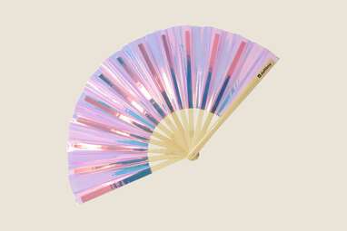 An iridescent purple hand fan. 