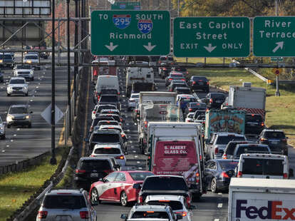 Heavy traffic moves along Interstate 295 on Wednesday morning November 22, 2023 in Washington, DC. This Thanksgiving season, the American Automobile Association (AAA) projects 71.1 million people will travel by car.