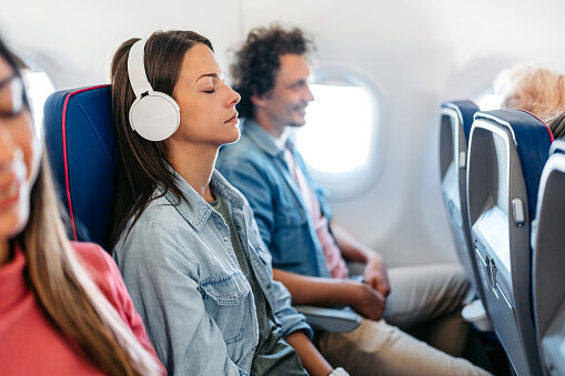 Travelers Are Begging Airports to Put Up ‘Use Headphones’ Signs