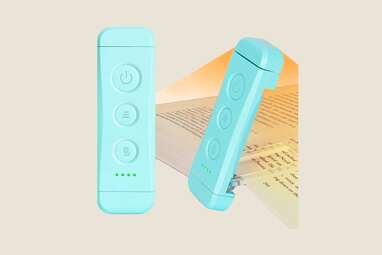 A blue reading light that is travel site.