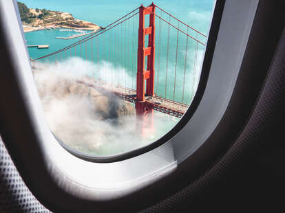 Aerial view of San Francisco Golden Gate Bridge from plane window