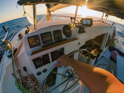 man on a sailing boat 