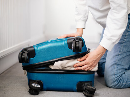 Preparation travel suitcase at home