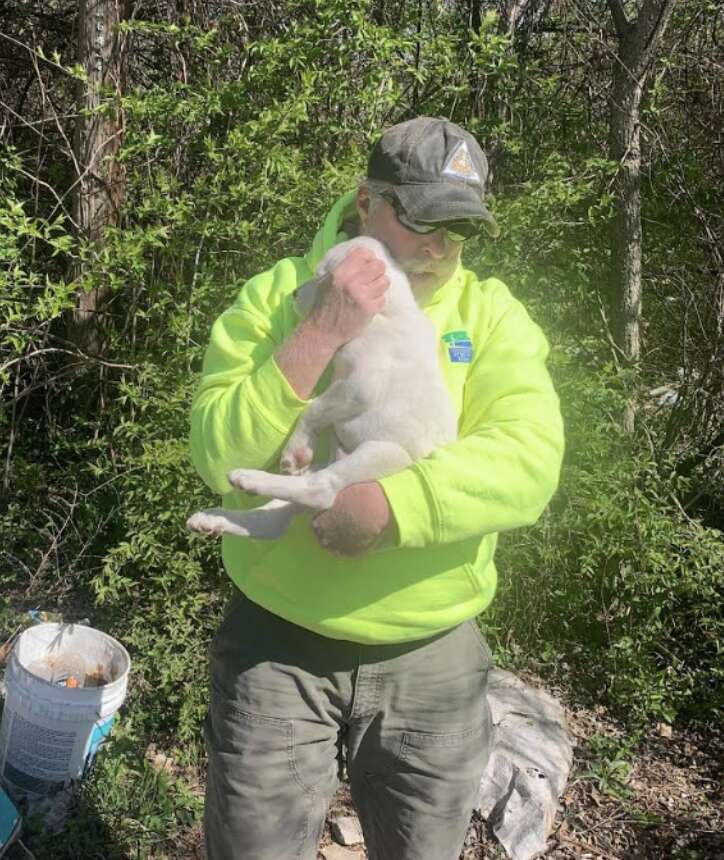 man holding dog