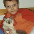 Man And His Beloved Cat Recreate Childhood Photo 20 Years Later