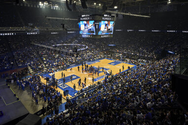 interior of rupp arena during a uk basketball game, with a big crowd