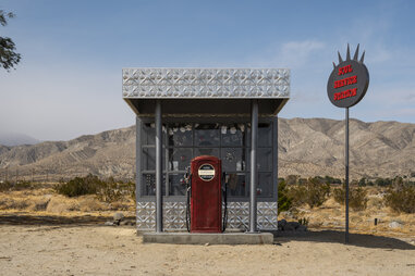 a fake gas station art installation for desert x outside of palm springs