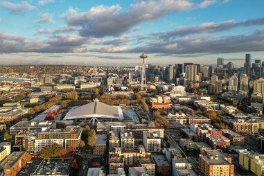 seattle skyline featuring the space needle on a typical partly cloudy day