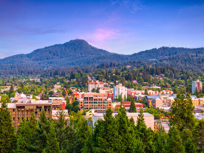 downtown and college campus in Eugene Oregon set among pine trees and hills